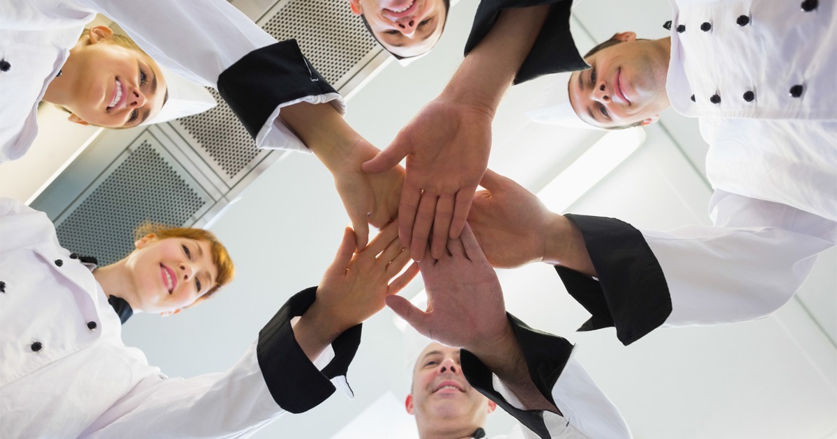 chefs with their hands