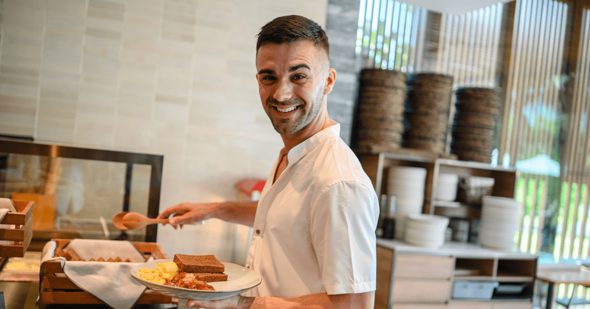 Man serving breakfast